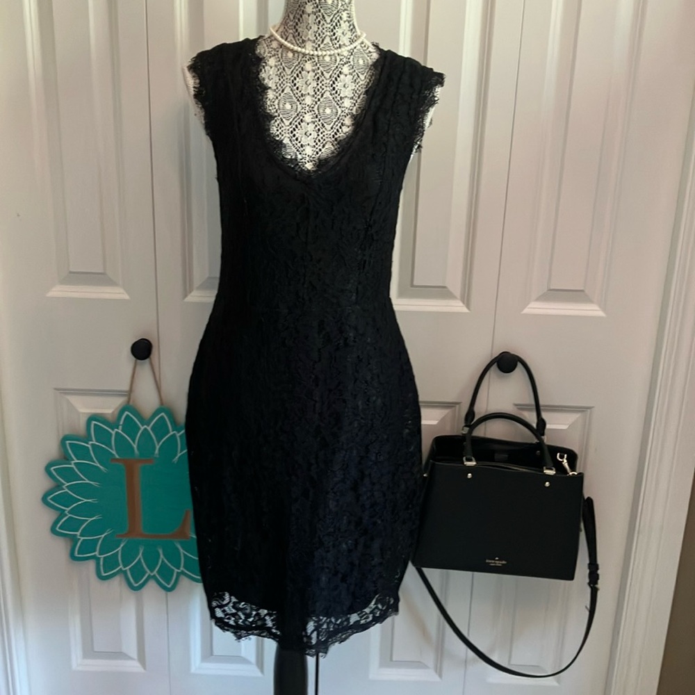 Size M Black sleeveless lace LBD with front V.